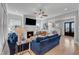 Sophisticated living room features a fireplace, built-in shelving, and a stylish seating arrangement at 1421 Sweetclover Dr, Wake Forest, NC 27587