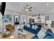 Open-concept living room with a ceiling fan and contemporary furnishings at 1421 Sweetclover Dr, Wake Forest, NC 27587