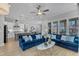 Bright, open-concept living room with hardwood floors and stylish furnishings at 1421 Sweetclover Dr, Wake Forest, NC 27587