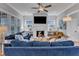 Elegant living room featuring a modern fireplace, built-in shelving, and comfortable seating at 1421 Sweetclover Dr, Wake Forest, NC 27587