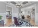 Bright office space with coffered ceilings, large windows, and modern chandelier at 1421 Sweetclover Dr, Wake Forest, NC 27587