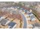 Aerial view of a neighborhood featuring well-maintained homes and landscaping at 176 E Ravano Dr, Clayton, NC 27527
