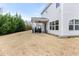 Spacious backyard featuring a covered patio and room for outdoor activities at 176 E Ravano Dr, Clayton, NC 27527