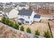Large backyard with covered porch, privacy fence, and mature trees at 176 E Ravano Dr, Clayton, NC 27527