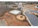 Aerial view of the community pool and playground in a well-maintained neighborhood at 176 E Ravano Dr, Clayton, NC 27527