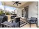 Inviting covered patio with stylish furniture, ideal for outdoor relaxation and entertaining at 176 E Ravano Dr, Clayton, NC 27527