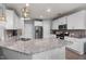 Spacious kitchen featuring granite countertops, stainless steel appliances, and ample cabinet space at 176 E Ravano Dr, Clayton, NC 27527