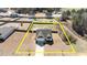 Aerial shot showing the home on a large lot outlined in yellow with neighboring houses at 229 S Prince Henry Way Way, Cameron, NC 28326