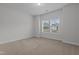 Carpeted bedroom with a window bringing in natural light and electrical outlets at 229 S Prince Henry Way Way, Cameron, NC 28326