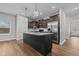 Beautiful kitchen featuring a center island with bar seating, stainless appliances, and ample cabinet space at 229 S Prince Henry Way Way, Cameron, NC 28326