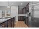 Bright kitchen with a large island, stainless steel appliances, and abundant cabinet space at 229 S Prince Henry Way Way, Cameron, NC 28326