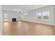 Airy living room with fireplace, ceiling fan, and lots of natural light at 229 S Prince Henry Way Way, Cameron, NC 28326