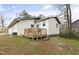 View of backyard and back porch with wooded deck at 2305 Fitzgerald Ave, Durham, NC 27707