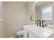 Stylish half bath with a modern vanity, sleek fixtures, and a well-lit mirror at 2305 Fitzgerald Ave, Durham, NC 27707