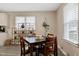 Cozy dining area with modern decor, a neutral color scheme, and natural light, creating a welcoming atmosphere at 2305 Fitzgerald Ave, Durham, NC 27707