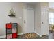 Inviting entryway with neutral walls, modern storage, and an accent rug, creating a welcoming atmosphere at 2305 Fitzgerald Ave, Durham, NC 27707