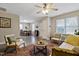 Inviting living room featuring neutral tones, a ceiling fan, and comfortable seating, perfect for relaxing and entertaining at 2305 Fitzgerald Ave, Durham, NC 27707