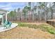 Spacious backyard featuring a patio, privacy fence and wooded views at 240 Forest Meadow Ln, Franklinton, NC 27525