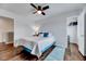 Cozy bedroom with a comfortable bed, ceiling fan, and a walk-in closet at 240 Forest Meadow Ln, Franklinton, NC 27525