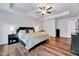 Bedroom with recessed ceilings, wood floors, and a ceiling fan, creating a comfortable retreat at 240 Forest Meadow Ln, Franklinton, NC 27525