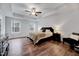 A spacious bedroom with recessed lighting, offering a serene retreat with a large window at 240 Forest Meadow Ln, Franklinton, NC 27525