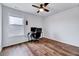 Office area with a window for natural light and wood-look floors offering a practical workspace at 240 Forest Meadow Ln, Franklinton, NC 27525