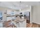 Stylish kitchen with a granite-topped island, stainless steel appliances, and ample cabinet space at 240 Forest Meadow Ln, Franklinton, NC 27525