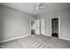 Bedroom featuring doors leading to a bathroom and closet space at 2513 Rolesville Rd, Wake Forest, NC 27587