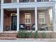 Welcoming front porch adorned with comfortable seating and lovely landscaping at 2631 Cloud Mist Cir, Raleigh, NC 27614