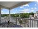 Cozy balcony with seating area and views of the surrounding neighborhood at 2810 Bedford Green Dr # 300, Raleigh, NC 27604