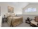Cozy bedroom with sloped ceiling, brass bed frame, and charming decor at 2810 Bedford Green Dr # 300, Raleigh, NC 27604