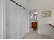 Hallway features a coat closet and access to the bathroom at 2810 Bedford Green Dr # 300, Raleigh, NC 27604