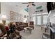 Spacious living room filled with natural light with neutral carpeting and decor creating a warm and inviting atmosphere at 2810 Bedford Green Dr # 300, Raleigh, NC 27604