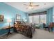 Comfortable main bedroom featuring a large bed, bedside tables, and bright windows at 2810 Bedford Green Dr # 300, Raleigh, NC 27604