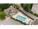 Aerial view of a community pool surrounded by lounge chairs at 2810 Bedford Green Dr # 300, Raleigh, NC 27604