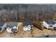 Aerial view showcases a well-maintained neighborhood with mature trees at 2981 Thurman Dairy Loop, Wake Forest, NC 27587