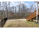 Outdoor living space features a fenced yard with a wooden deck and lawn at 2981 Thurman Dairy Loop, Wake Forest, NC 27587
