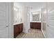 Spacious bathroom with double sink vanity and glass-enclosed shower at 2981 Thurman Dairy Loop, Wake Forest, NC 27587