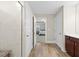 Open bathroom with a tiled walk-in shower and tile floors that flow into the bedroom at 2981 Thurman Dairy Loop, Wake Forest, NC 27587