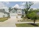 Beautiful two-story home featuring a two-car garage, manicured lawn, and tasteful landscaping at 2981 Thurman Dairy Loop, Wake Forest, NC 27587
