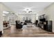 Spacious living room with hardwood floors, coffered ceiling, and large windows at 2981 Thurman Dairy Loop, Wake Forest, NC 27587