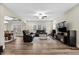 Spacious living room featuring hardwood floors, a coffered ceiling, and comfortable seating at 2981 Thurman Dairy Loop, Wake Forest, NC 27587