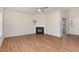 Large living room featuring wood floors and a fireplace, perfect for Gathering gatherings and relaxation at 3020 Buttonwood Ln, Clayton, NC 27520