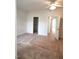 Spacious main bedroom with neutral walls, ceiling fan, and a doorway to an ensuite at 3123 Hudson Hill Ln, Raleigh, NC 27612