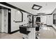 Finished basement with a bar area, seating, and a pool table at 318 W Lillington St, Angier, NC 27501