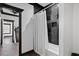Contemporary bathroom with black and white tiled shower, modern fixtures, and neutral color palette at 318 W Lillington St, Angier, NC 27501