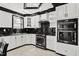 Close-up of the kitchen area, showcasing modern appliances and countertops at 318 W Lillington St, Angier, NC 27501