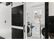 Convenient laundry room with a sink, washer, and dryer, located near the kitchen at 318 W Lillington St, Angier, NC 27501
