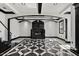 Living room with fireplace, recessed ceiling, and checkered flooring at 318 W Lillington St, Angier, NC 27501