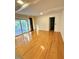 Bright living room with hardwood floors and access to the patio at 325 Old Salem Rd, Roxboro, NC 27573